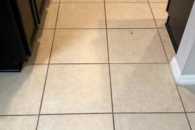 Dirty tile floor before grout cleaning in Flagler Beach
