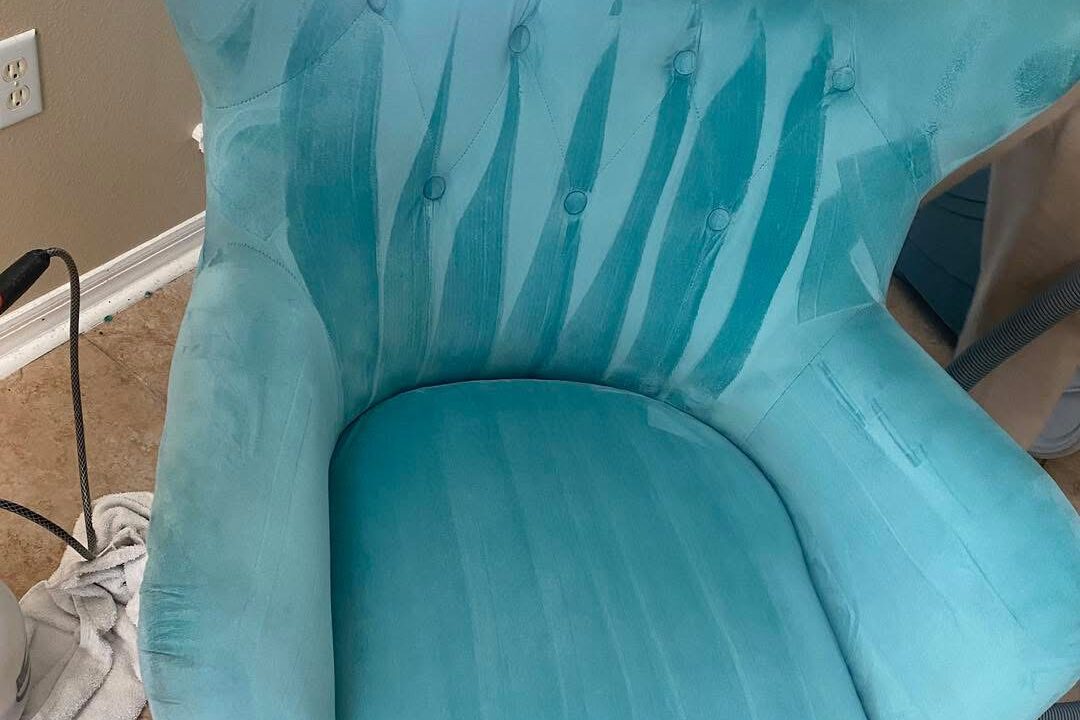 Freshly cleaned upholstered chair after service